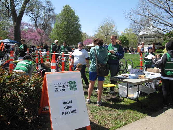 A Lawrence Complete Streets advocacy group offered valet parking for bicycles at the Earth Day Celebration on Saturday, April 16, 2011, in South Park. Complete Streets are streets designed with all users in mind including bicyclists, public transportation vehicles and riders, and pedestrians of all ages and abilities.