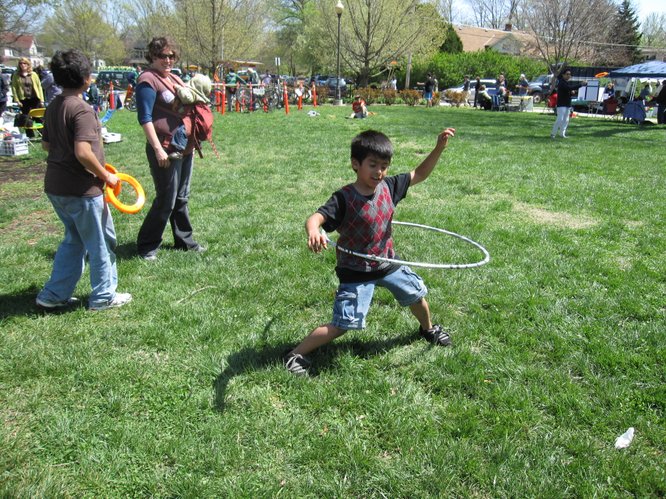 Eight-year-old Daniel Rojo, Lawrence, shows off his hula-hooping talents during the Earth Day Celebration in South Park.