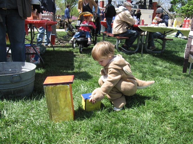 Winslow Parker, 2, of Lawrence, was playing during the Earth Day festivities on Saturday, April 16, 2011, in South Park. His mother is Elizabeth Garrett.