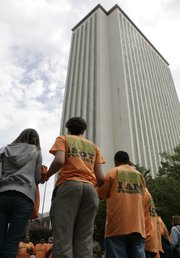 Demonstrators gather outside the Florida Capitol after an immigration bill passed the Senate in Tallahassee, Fla., May 4, 2011. A watered-down immigration measure that would require one-stop career work centers to verify the employment eligibility of workers has passed in the Florida Senate. Almost every state in the union decided to tackle immigration on its own this year in the absence of any federal action on the issue. But an Associated Press review of the data found that as of Wednesday almost all of the punitive measures failed.