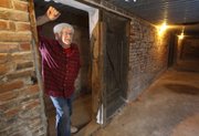 "The businesses they put down here were for men only," says Bill
Starr, owner of Starr Antiques, the Wolf Hotel and the Ellinwood
Underground. Starr leads tours of the tunnels beneath Ellinwood.