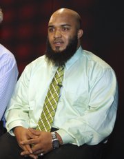 In this Feb. 14, 2011 file photo, Abdullah al-Kidd is seen in Los Angeles. The Supreme Court ruled Tuesday that former Attorney General John Ashcroft cannot be personally sued over his role in the post-9/11 arrest of an American Muslim who was never charged with a crime. By a 5-3 vote, the court said Ashcroft did not violate the constitutional rights of Abdullah al-Kidd.
