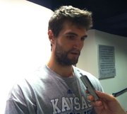 Kansas University center Jeff Withey talks to reporters on Friday, June 3, at Allen Fieldhouse. Withey returned to the United States this week after a two-week trip to Europe, where he played basketball for Athletes in Action.