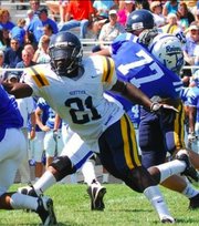 Tunde Bakare makes a move toward a ball carrier in this 2010 file photo from when he played at Highland Community College. Bakare is hoping to make an impact with the Kansas University linebacking corps this fall as a junior.