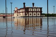 Terrible's St. Jo Frontier Casino is surrounded by floodwaters Tuesday, June 28, 2011, in St. Joseph, Mo. The casino has been closed indefinitely after its parking lot flooded and water went above a boat dock on the backside of the lot.