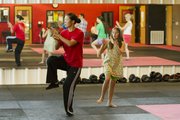 Chen Huixian, left, guides students through basic tai chi moves as Zoey Chi, 10, Lawrence, attempts to follow Huixian’s lead during a beginner tai chi class held at Premier Martial Arts Academy.