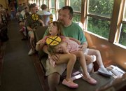 Ted Smith, Lawrence, and his daughters Sydney, 5, and Samantha, 3, ride the Midland Railway during the Railroadiana Labor Day Railfest in Baldwin City, Saturday, Sept. 3. Rides continue through Monday.