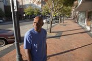Joe Jones scans the area along South Kansas Avenue in Topeka where he was walking one night in 1985 and was the start of a major change in in life. Jones is trying to get his life together these days after spending nearly eight years in prison for rape. He was the first person in the state of Kansas cleared through DNA evidence.