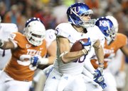 Kansas running back Brandon Bourbon turns up field against Texas during the third quarter on Saturday, Oct. 29, 2011 at Darrell K Royal-Texas Memorial Stadium.