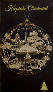 This Lawrence Keepsake Ornament features the Douglas County Courthouse, South Park gazebo, Watkins Community Museum of History and KU's Fraser Hall and the Campanile. Sales of the ornament benefit programs and services offered through the Kiwanis Club of Lawrence.