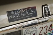 Dorwin Lamkin, of Mission, has a bumper sticker and specialty license plate on his Lincoln Towncar. Lamkin is one of a handful of Kansas survivors from the attack on Pearl Harbor. He was on the USS Nevada.