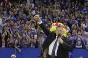 Newly appointed Kansas University head football coach Charlie Weis is introduced at halftime of KU's men's basketball game against Ohio State on Saturday, Dec. 10, 2011 at Allen Fieldhouse.