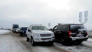 A Texas Highway Patrol trooper with the Texas Department of Safety stops traffic on Interstate 40 near Hope Road outside Amarillo Texas Tuesday, Dec. 20, 2011 after a severe winter storm hit Northwest Texas. Travelers in the Texas Panhandle were urged to stay off ice-packed roads Tuesday after up to 10 inches of snow covered parts of the region. Several major thoroughfares were closed after the storm clipped the far northwest part of the state the day before the official start of winter.