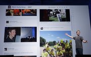 FILE - In this Sept. 11, 2011 file photo, Facebook CEO Mark Zuckerberg shows Timeline during the f/8 conference in San Francisco. Timeline offers highlights from your whole life, all the way back to your birth. But these are highlights as Facebook sees it - the stuff you and your friends had chosen to write or post photos about over the years.