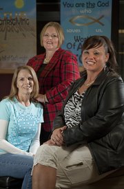 Dot Fernandez, left and Cindy Manske, center, run Freedom Foundation Ministries, which mentors female prisoners in Topeka. Diana Jurik, right, is an ex-convict who has gone though their program and continues to be mentored by Fernandez.