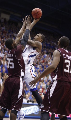 Kansas forward Thomas Robinson goes up for a shot against Texas A&M forward Ray Turner during the second half on Monday, Jan. 23, 2012 at Allen Fieldhouse.
