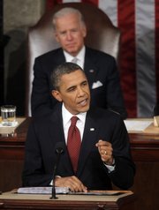 President Barack Obama gives State of the Union address on Capitol in Washington, Tuesday, Jan. 24, 2012. Vice President Joe Biden is behind the president.