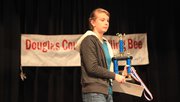 Emma Steimle, of West Middle School, was named the winner in the Douglas County Spelling Bee at Southwest Middle School on Saturday, Feb. 4, 2012..