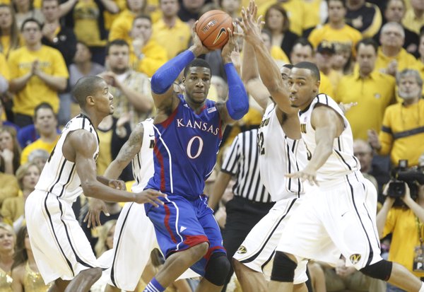 Kansas forward Thomas Robinson is hounded by the Missouri defense during the first half on Saturday, Feb. 4, 2012 at Mizzou Arena.