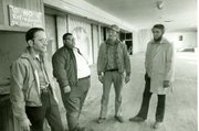 Founders of the Lawrence Boys' Club, Bob Wells and Bobby Lee and other community members survey the space for the club in this 1973 photo. The boys club was first housed on the third floor of a building that stood at 10th and Mass St.