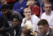 Kansas commit Conner Frankamp, center, watches from behind the bench prior to tipoff against Missouri on Feb. 25, 2012, at Allen Fieldhouse.