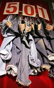 A Levi's 501 jean display is seen at the flagship store Oct. 11, 2005, in San Francisco. These days, our country’s (arguably) best-dressed men can often be spotted wearing field jackets, chambray work-shirts, duck canvas pants, selvedge denim and tweed. It’s clothing you might have expected to see on farms and in factories, or even “when you were younger.”