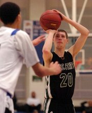 Free State's Tyler Self pulls back for a three pointer as the Firebirds played Leavenworth in first round of sub-state Thursday, March 1, 2012, at Leavenworth.