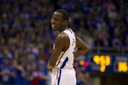 Kansas senior guard Tyshawn Taylor (10) flashes a smile during the second half Saturday, March 3, 2012 at Allen Fieldhouse.
