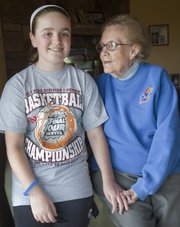 Catherine Grosdidier, 12, and her grandmother Helen Grosdidier, 92, both of Eudora, are big fans of the KU women's basketball team. Catherine attended the games in Little Rock, Ark., last week and will travel to Des Moines to watch KU play Tennessee Saturday. After the women's win against Delaware Tuesday, Catherine called her grandmother to share the good news.