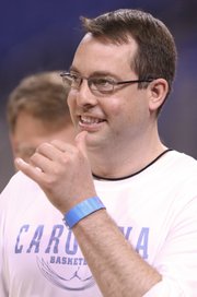 North Carolina assistant coach Jerod Haase watches over practice at the Edward Jones Dome in St. Louis.