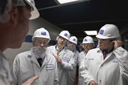 Craig Letch, director of food quality and assurance for Beef Products Inc. (BPI), left, leads a tour of governors from left: Iowa Gov. Terry Branstad, Kansas Gov. Sam Brownback, South Dakota Lt. Gov. Matt Michels, Nebraska Lt. Gov. Rick Sheehy and Texas Gov. Rick Perry, Thursday, March 29, 2012, through Beef Products Inc.'s plant in South Sioux City, Neb., where the beef product is made. The governors of Iowa, Texas and Kansas and lieutenant governors of Nebraska and South Dakota toured the plant to show their support for the company and the several thousand jobs it creates in Nebraska, Iowa, Kansas, South Dakota and Texas.
