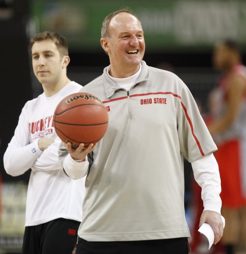 Ohio State head coach Thad Matta smiles as he watches over the Buckeye's during a day of practices at the Superdome on Friday, March 30, 2012.