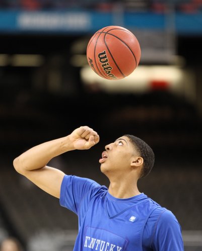 Kentucky forward Anthony Davis bounces the ball off his fist during the Wildcats' practice at the Superdome on Friday, March 30, 2012.