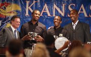 Teammates Thomas Robinson and Tyshawn Taylor have a laugh with head coach Bill Self and former assistant Danny Manning after the players were presented as co-recipients of the Mr. Jayhawk Danny Manning Award for the 2011-12 season, during the Men's Basketball Banquet on Monday, April 9, 2012 at the Holidome.