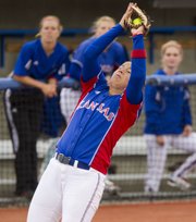 Kansas third baseman Chanin Naudin grabs a pop fly during KU's game against Iowa State Sunday, April 22, 2012 at Arrocha Ballpark.
