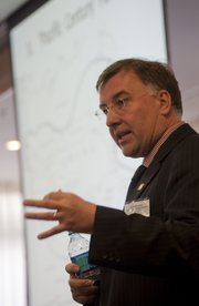 Graeme Herd, head of the International Security Program at the Geneva Centre for Security Policy, speaks on “After Afghanistan: Implications and Emerging Paradigms after Withdrawal” during a conference Wednesday at Kansas University.