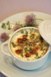 Herbed Baked Eggs are an easy but elegant dish to make for mom on Mother's Day. Fresh herbs add garden flavor.