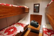 The re-creation of a third class cabin on board the Titanic contains White Star Line bedding. "Titanic: The Artifact Exhibition" will be at Union Station in Kansas City, Mo., through Sept. 3, 2012.