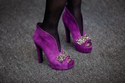 This Saturday, Feb. 11, 2012, photo shows the shoes worn by a guest at Lincoln Center during Fall Fashion Week, in New York. Wear a fun pair of heels to a summer wedding.