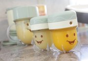 To prepare her son Camden’s food, Christina Hobbs uses the Baby Bullet for pureeing, which comes with storage jars.