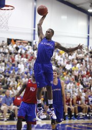 Kansas guard Ben McLemore elevates for a jam during a scrimmage on Wednesday, June 20, 2012, at the Horejsi Center.