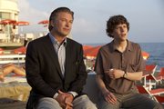 This film image released by Sony Pictures Classics shows, Alec Baldwin as John, left, and Jesse Eisenberg as Jack in a scene from “To Rome With Love.”