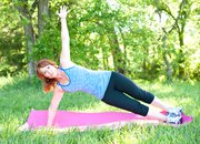 For the side plank, keep a straight line from head to heels and extend the top arm above the shoulder.