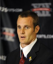 Kansas quarterback Dayne Crist speaks during the Big 12 college football media days on Tuesday, July 24, 2012, in Dallas.