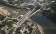 An aerial view looking south shows the continued construction of the Bowersock Mills & Power Co.’s hydroelectric power plant on the north side of the Kansas River on July 24. During the next three to four weeks, crews will install a “rubber dam,” a large rubber inner tube-like device, across the top of the current dam.