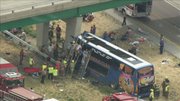 This photo from video provided by KSDK-TV NewsCenter5 in St. Louis, shows the scene near Litchfield, Ill., where a double-decker Megabus struck a concrete bridge pillar along Interstate 55 in southern Illinois. There was no immediate word of injuries in the Thursday afternoon wreck.