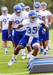 Kansas University's Toben Opurum, shows his agility during practice Monday, Aug. 13, 2012, at the KU practice fields.
