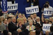Delegates from the state of Georgia applaud after casting their votes for presidential candidate Mitt Romneyduring the Republican National Convention in Tampa, Fla., on Tuesday, Aug. 28, 2012.
