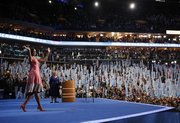 First lady Michelle Obama waves to delegates at the Democratic National Convention in Charlotte, N.C., on Tuesday.