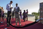 Kansas basketball players Jeff Withey, left, and Elijah Johnson, wait on the red carpet before entering the Lied Center for the Rock Chalk Choice Awards Sunday, Sept. 9, 2012.